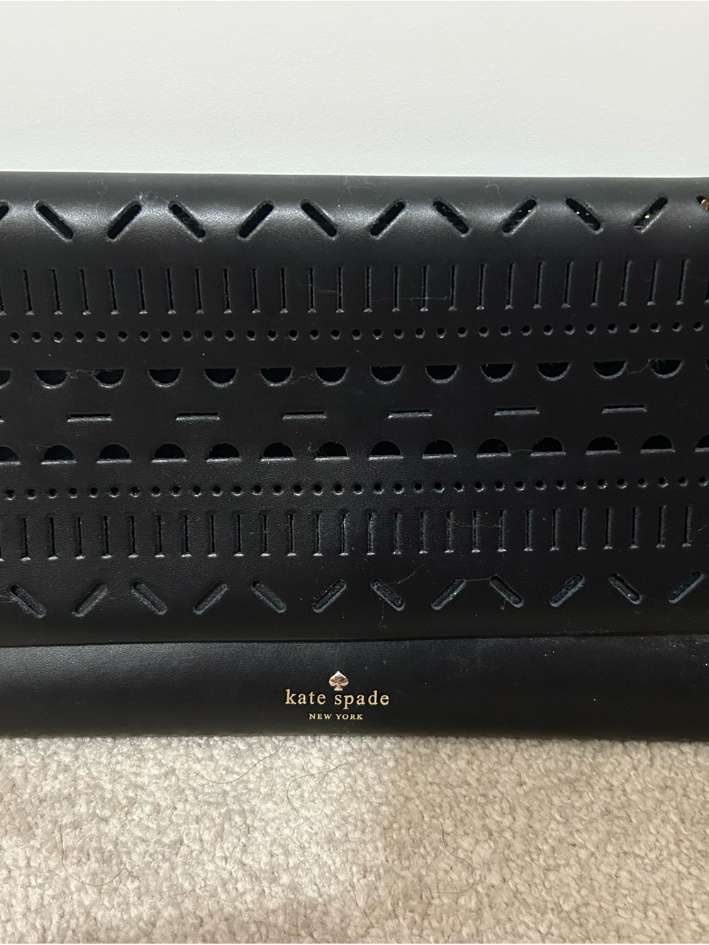 kate spade Black Perforated Leather Clutch with Gold Logo